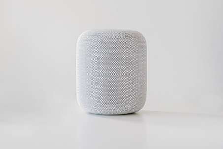 White Apple Homepod smart speaker