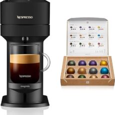 Nespresso Vertuo Next black coffee machine brewing coffee, alongside a box of colorful coffee capsules