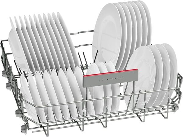 Upper dishwasher rack filled with plates and glasses